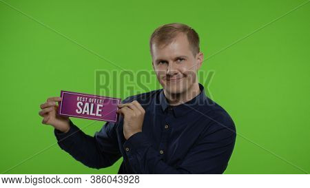 Man Shopper Showing Best Offer Sale Advertisement Inscription In His Hands. Guy Looking Happy Of Goo