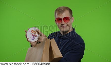 Happy Cheerful Man With Shopping Bags Smiling In Sunglasses And Showing Great Purchase Discount Perc