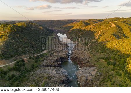 Pulo Do Lobo Waterfall Drone Aerial View With River Guadiana And Beautiful Green Valley Landscape At