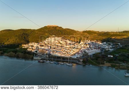Aerial Drone View Of Sanlucar De Guadiana In Spain, From Alcoutim In Portugal