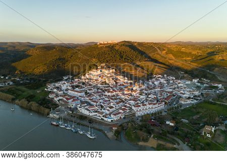 Aerial Drone View Of Sanlucar De Guadiana In Spain, From Alcoutim In Portugal