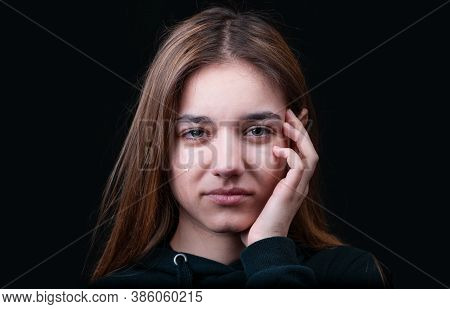 Portrait About A Teenage Girl Crying.dissapointed Young Woman Has Troubles. Isolated On Black Basckg