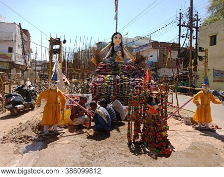 District Katni, India - March 21, 2020: Holika Dahan Preparation On Road With Cow-dung Cries On Road