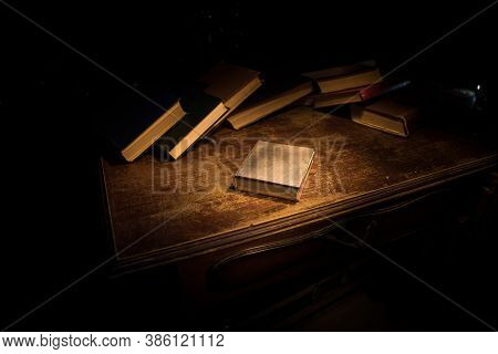 Imagine A Picture Book Of An Ancient Book Opened On A Wooden Table With A Sparkling Golden Backgroun