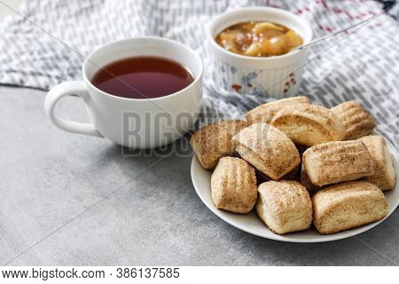 Tasty Breakfast. Homemade Sweet Cinnamon Cookies And Cup Of Tea. Apple Confiture On Background. Copy