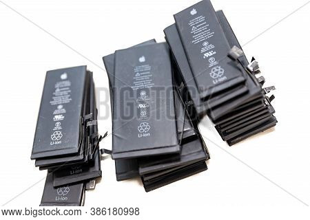 Russia - July 27, 2020: Broken Iphone Apple Phone Used Rechargeable Batteries In Recycling Chip Repa