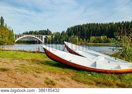Autumn Landscape Of Bridge And Boats On Kymijoki River In Finland, Kouvola, Koria