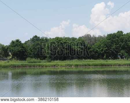 Wild Landscapes Reflected In Waters Of Artificial Lake In European Goczalkowice Town At Silesian Dis