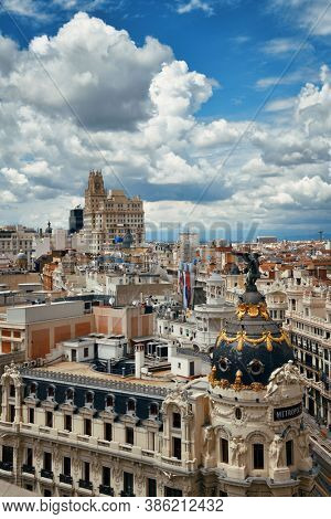 MADRID, SPAIN â MAY 13, 2019: Telefonica Building and historical buildings in business district rooftop view.