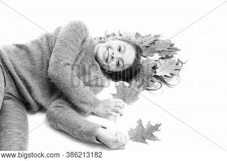 Child Enjoy Fall Season. Girl Cute Kid Long Hair Lay On White Background With Fallen Leaves. Dry Map