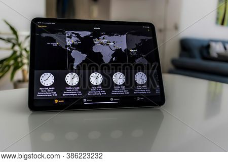 Frankfurt, Germany - September 17th 2020: A German Photographer Installing The All New Ipados 14 Sof