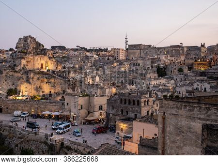 Matera; Italy - September 17; 2019: Bond 25. Scene Of A Procession With Extras Carrying Candles. Fro