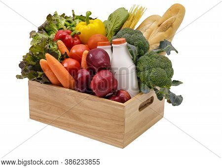 Wooden Crate With Multi Collor Vegetables , Fruit, Milk And Baguette Isolated On White Background. G