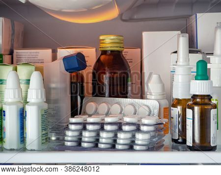 Blisters With Pills, Bottles With Drops, Sprays And Gels, As Well As Boxes With Drugs Close-up On Th