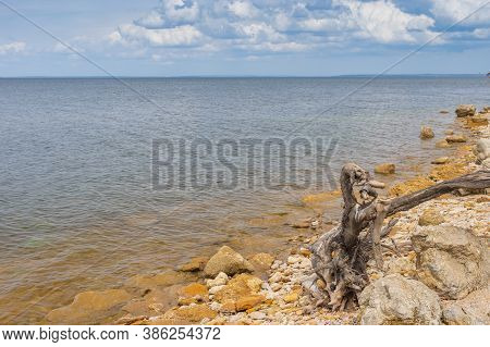 Spring Landscape With Wild Pebble Beach On Kakhovka Reservoir Located On The Dnipro River