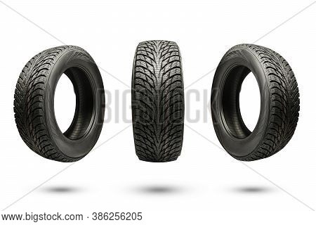 Three Winter Friction Tires, Isolate On A White Background