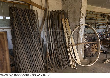 Barskon, Kyrgyzstan - July 10, 2019:  Wood Construction In A Yurt (ger) Factory And Workshop, Kyrgyz