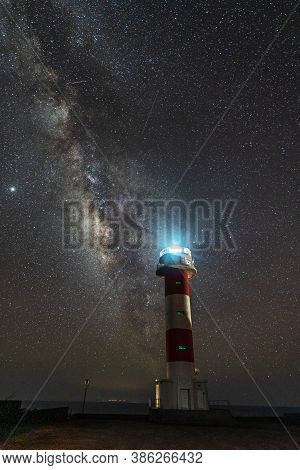 Fuencaliente Lighthouse With The Milky Way On The Route Of The Volcanoes South Of The Island Of La P
