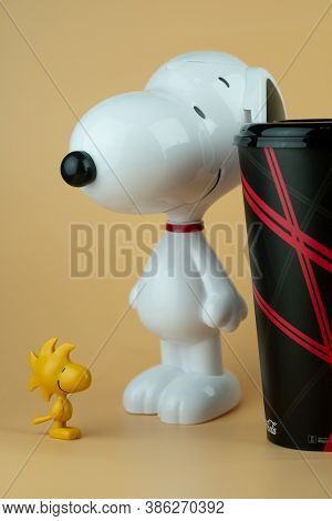 Samut Prakan, Thailand - September 21, 2020 : Set Of Popcorn Bucket And Drink Cup Of Cartoon Snoopy 