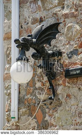 Puerto Vallarta, Mexico - April 25, 2008: Church Of Our Lady Of Guadalupe. Dark Metal Lantern Holder