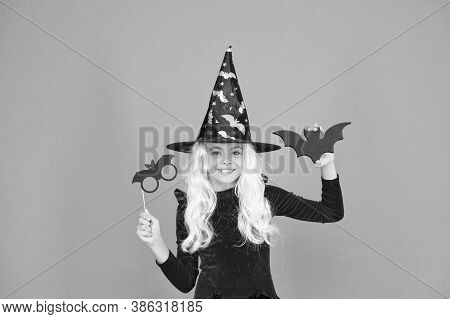 Curse Spell. Little Girl Cast Magic Spell Orange Background. Wicked Witch Spell. Magic And Witchcraf