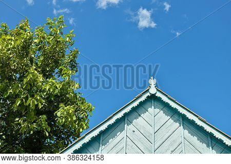 Beautiful Wooden Decoration On The Traditional Fronton House In Danube Delta Region