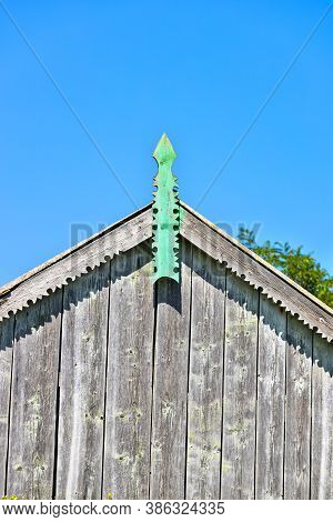 Beautiful Wooden Decoration On The Traditional Fronton House In Danube Delta Region