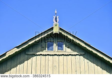 Beautiful Wooden Decoration On The Traditional Fronton House In Danube Delta Region