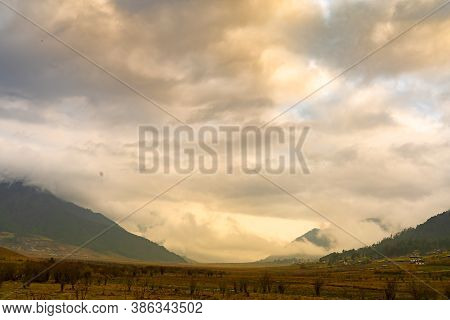 Beautiful Clouds & Mountain At A Natural Place Phobjika, Bhutan.