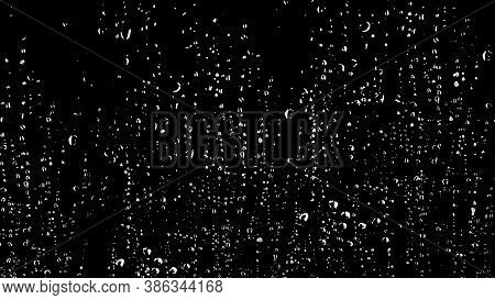 White Color Of Rain Drop Or Water Drop On The Glass On The Black Background When Rainny Season Comin