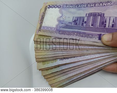 One Thousand Taka Bangladeshi Bank Note In Finger