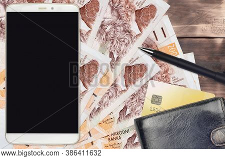 200 Czech Korun Bills And Smartphone With Purse And Credit Card. E-payments Or E-commerce Concept. O