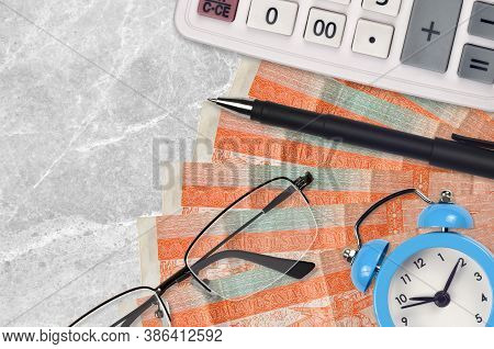 3 Cuban Pesos Convertibles Bills And Calculator With Glasses And Pen. Business Loan Or Tax Payment S