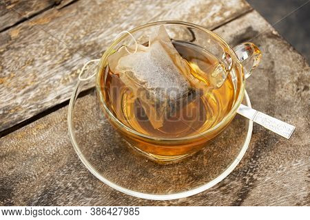 England Jasmine Tea In Glass Cup Serve On Plate At Cafe Coffee Shop In Chiang Mai, Thailand