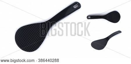 Plastic, Heat-resistant Spoon Stirrer For Multicooker. Black Spoon Isolated On White Background.