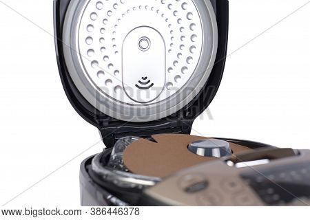 Automatic Modern Multicooker Isolated On White Background. Household Appliances Programmed For The P