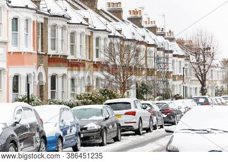 Terraced Houses Covered With Snow Around West Hampstead Area In London While Snowing And Sleeting