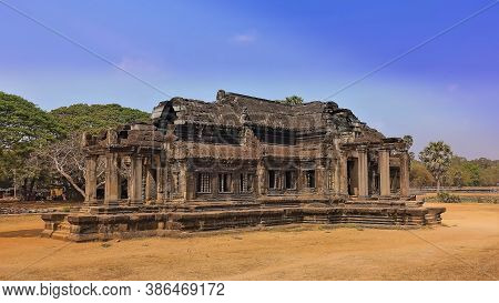Angkor Wat Library Building. Sunny Summer Day. The Ruins Of An Ancient Stone Unique Cruciform Buildi