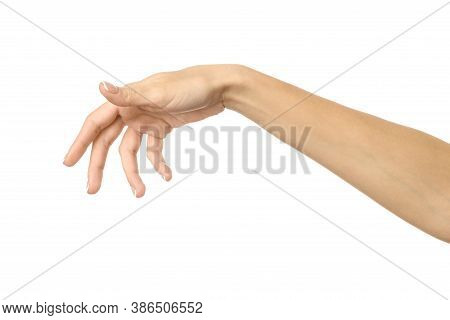 Hand Picking, Holding, Grabbing Or Reaching. Woman Hand Gesturing Isolated On White