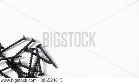 Self-cutters On A White Background Banner With Space For Text. Construction Tools, Self-tapping Scre