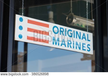 Bordeaux , Aquitaine / France - 09 20 2020 : Original Marines Logo And Red Blue Sign Storefront From