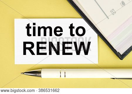 Time To Renew. Text On White Paper On Yellow Background