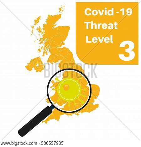 Covid-19 Uk Threat Level 3 (yellow) With Map And Magnifying Glass