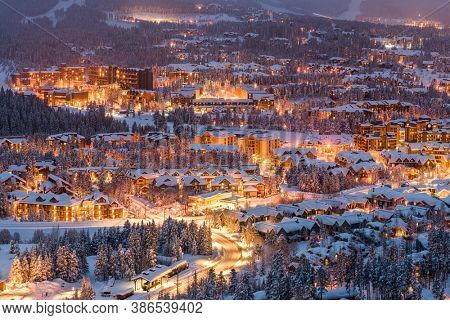 Breckenridge, Colorado, USA town skyline in winter at dusk.