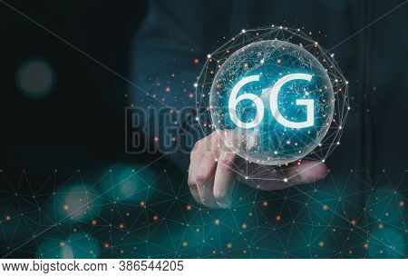Business And Technoloy Concept.business Man Touch 6g  Internet Technology And Network.