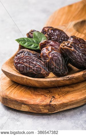Large Sweet Dates Close-up. Useful Sweets For Tea. Large Sweet Dates
