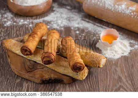 Traditional Turkish Borek Or Turkish Pastry With Minced Meat, Cheese And Spinac On Wooden Background
