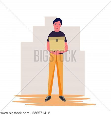 A Man Stands And Holds A Box Parcel. Courier With A Box