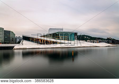 Oslo, Norway - August 10, 2019: Exterior View Of Opera House In Oslo. Long Exposure At Dusk. New Mod