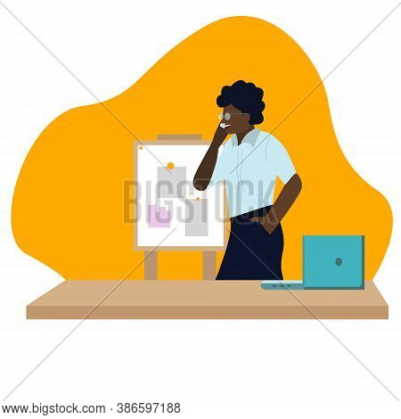 A Dark-skinned Man Is Talking On The Phone Against The Background Of Graphs. African American Busine